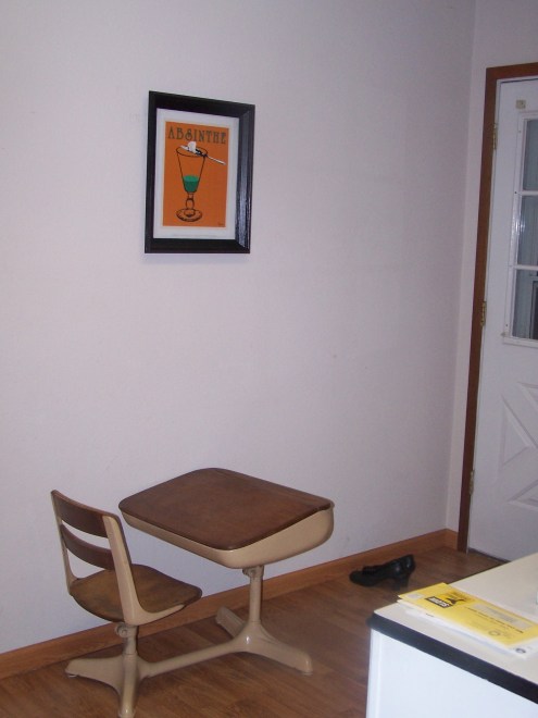 Here is the desk and the huge wall. The one picture is hung, but the other two are waiting to be framed. 