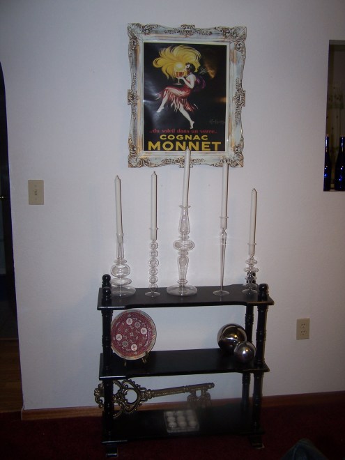 This is the little wall space next to the window. I love this set up. I always love antique frames.