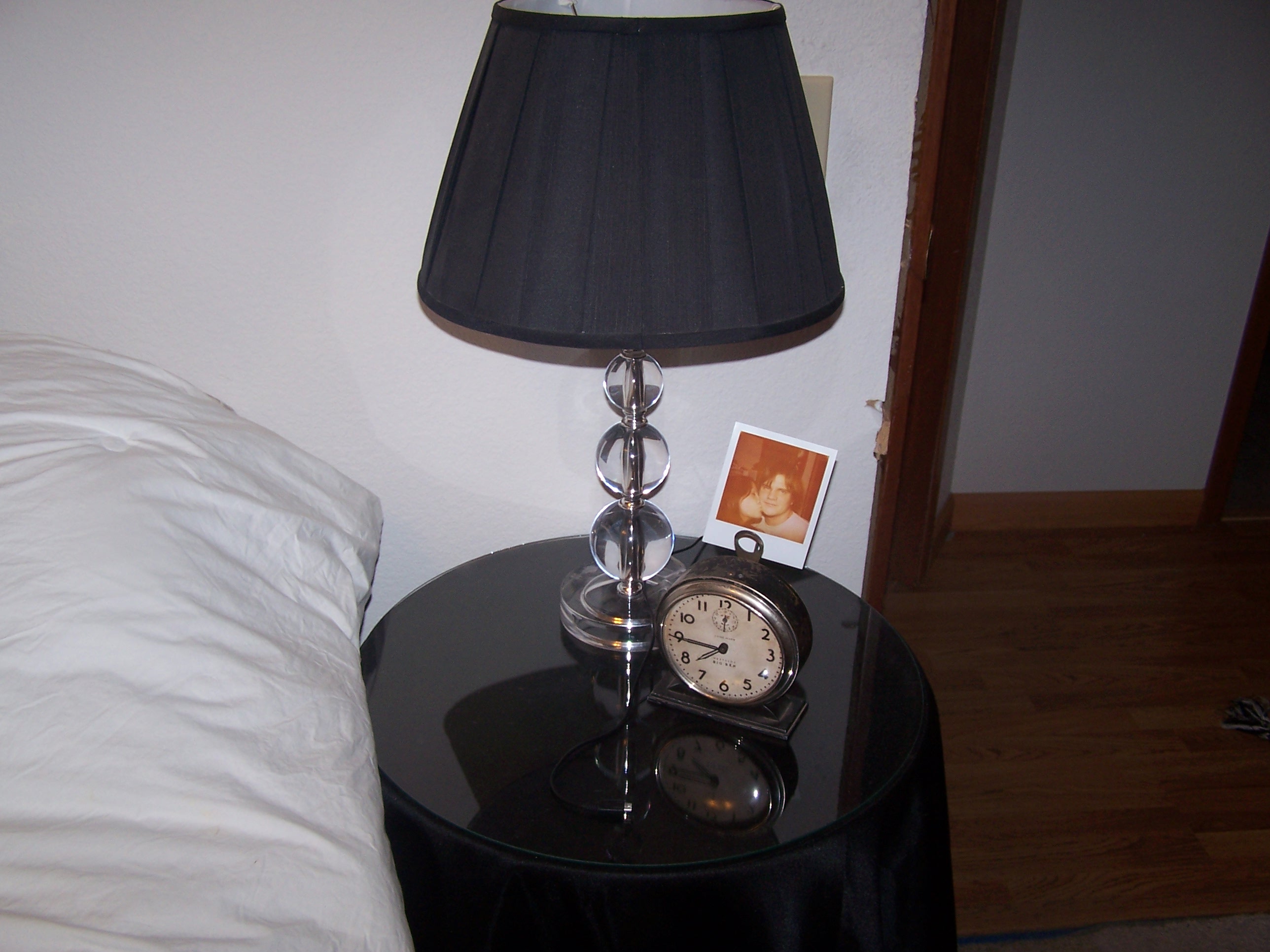 A close up view of the side table. This one happens to be Tony's.