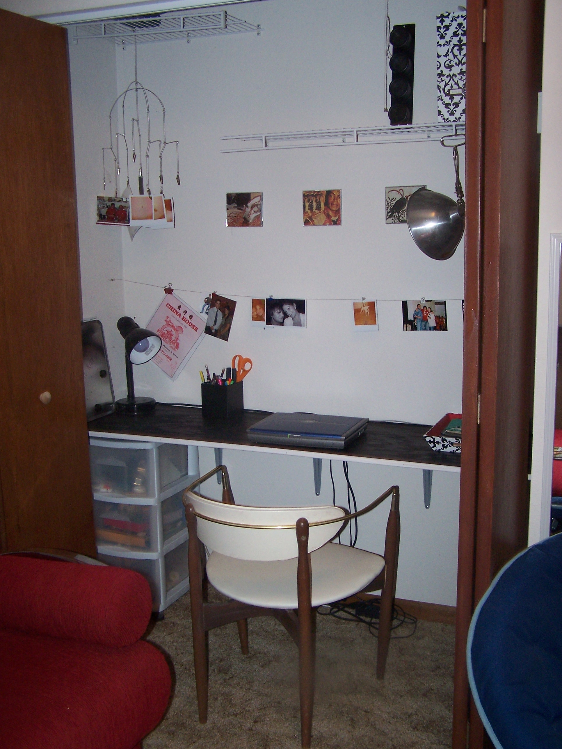  This is the closet office.  Tony made this desk for me.  I used wire to hang pictures.  I'm not sure, but even after editing, it still feels a little cluttered to me.  Any suggestions?