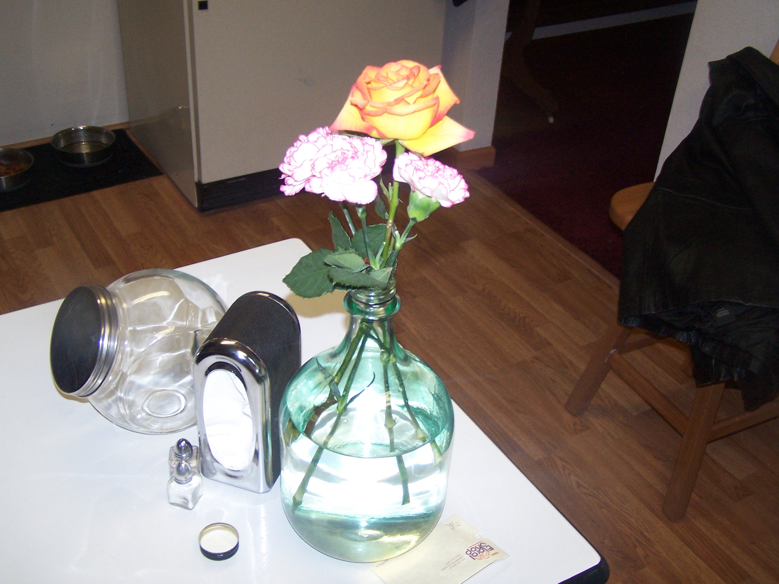 I took them home and added them to a vintage wine bottle.  It was all we had that was skinny enough, but I ended up loving it!