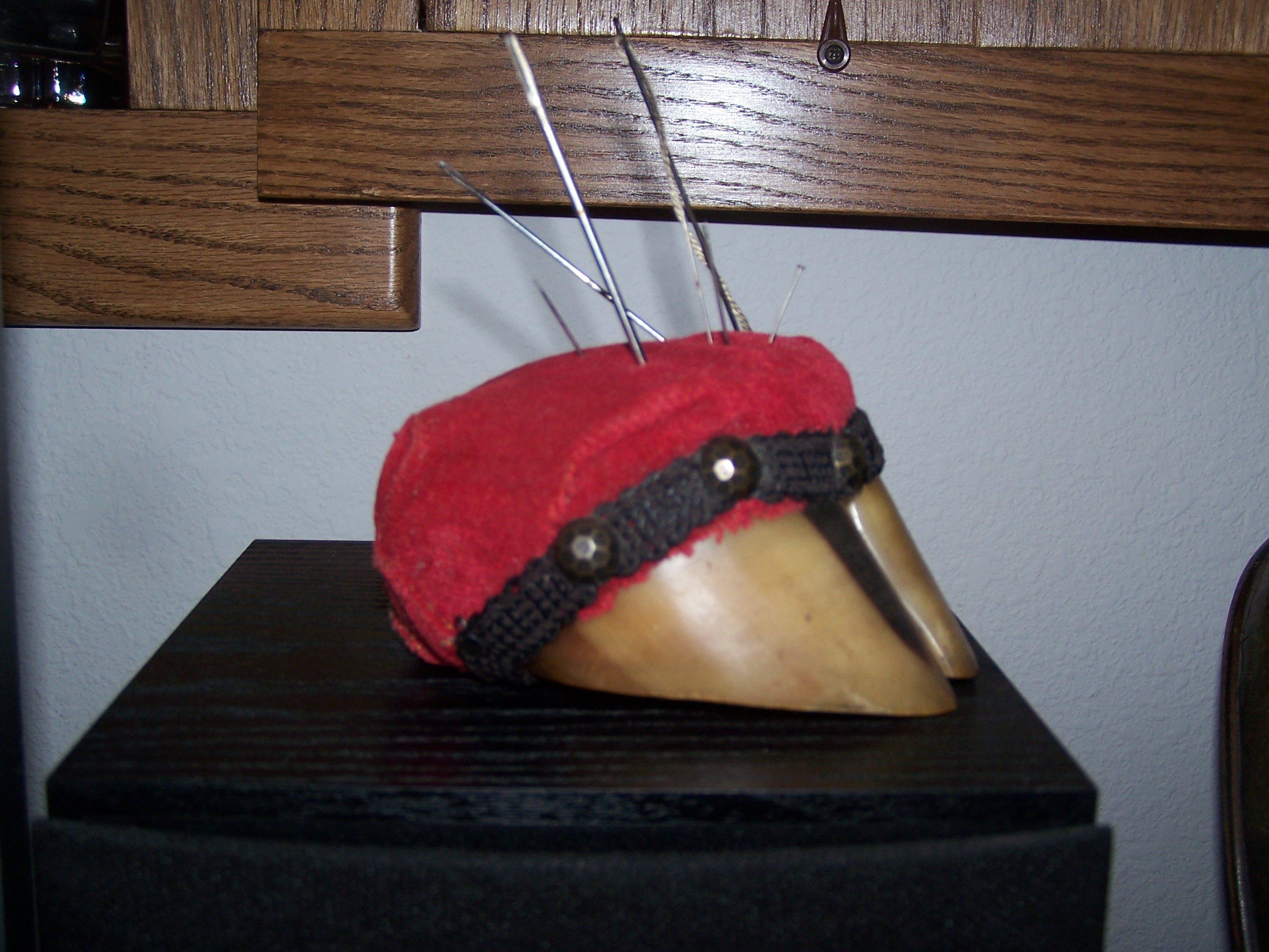 This is an old pin cushion made from a hoof that we used to play with as kids.  I know, kinda creepy, but I think it is totally cool!