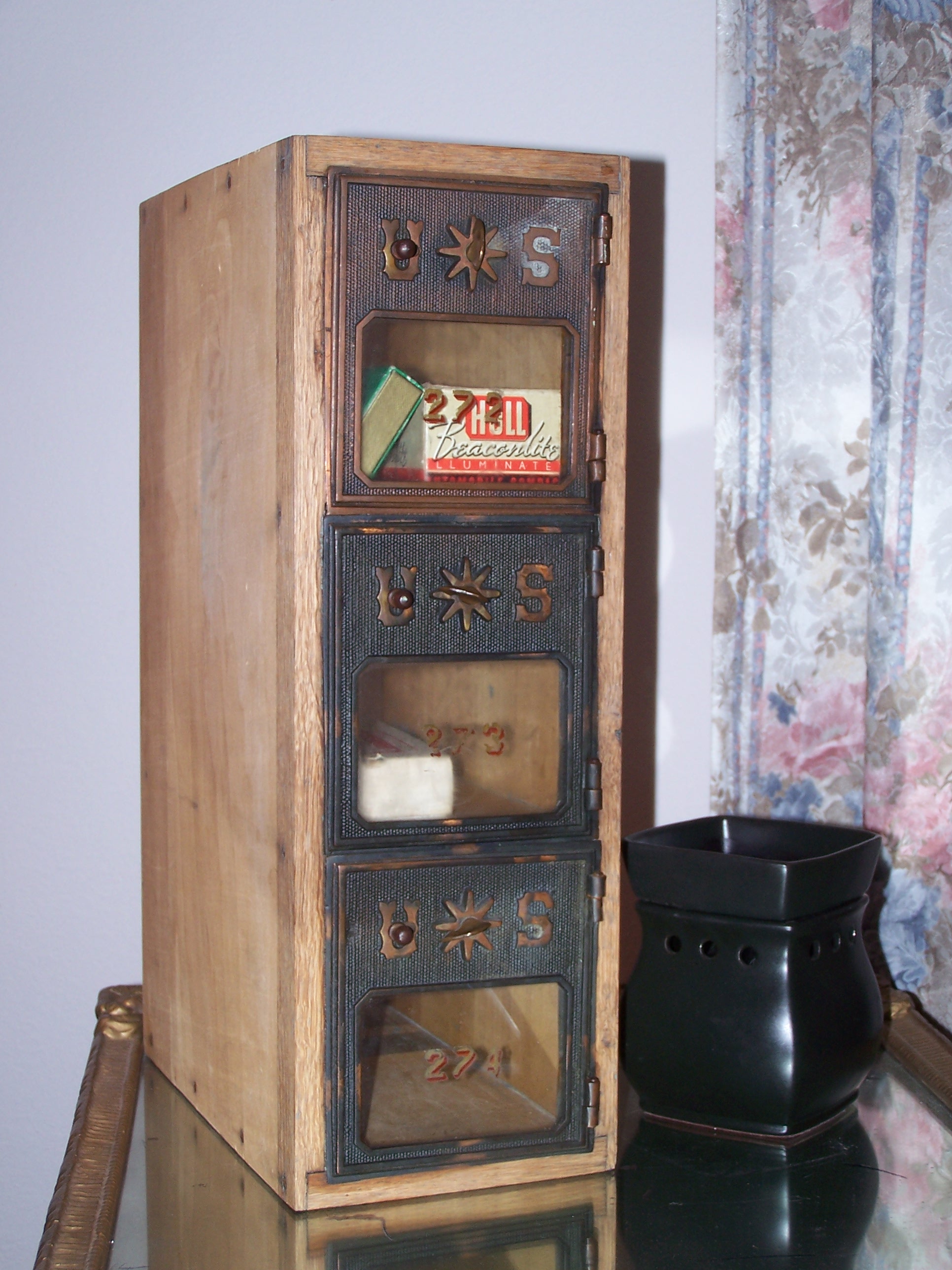These are some antique mail boxes from a post office that my grandpa owns.  They are so perfect (and more of those cubbies I love).  We just aren't sure where to put them yet.