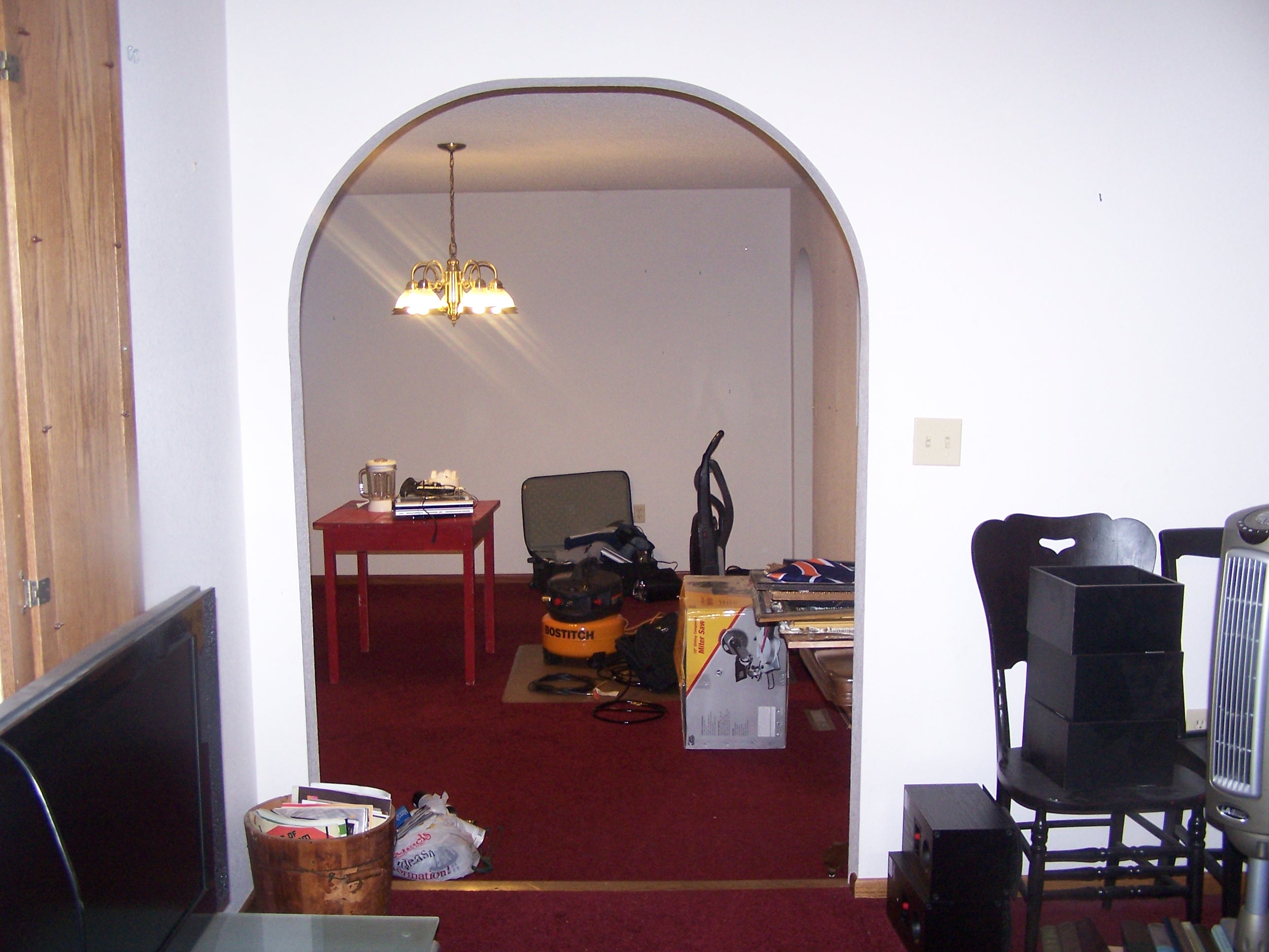 A view from the living room into the dining room. Stuff was everywhere!