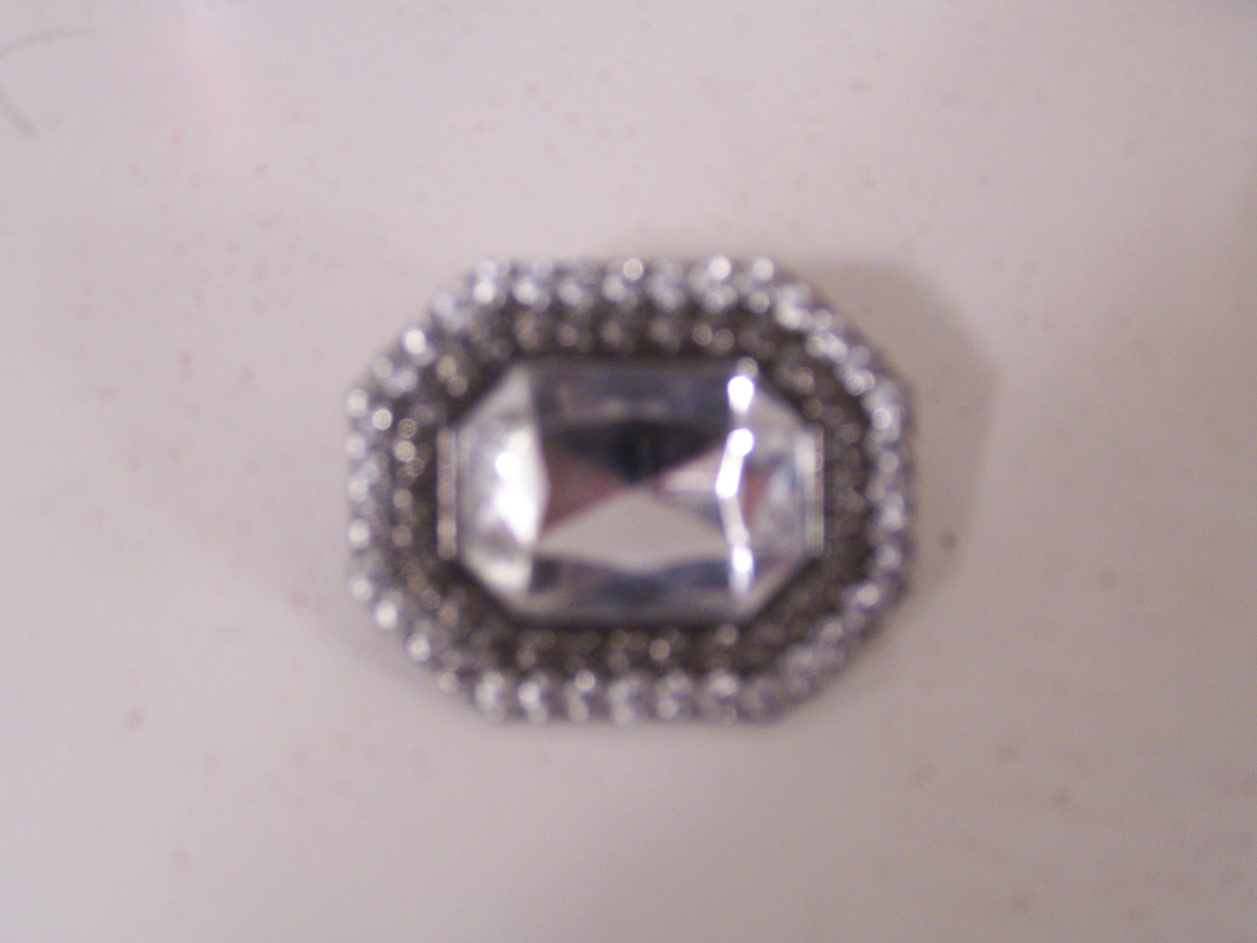 The ring to match the belt on the dress.