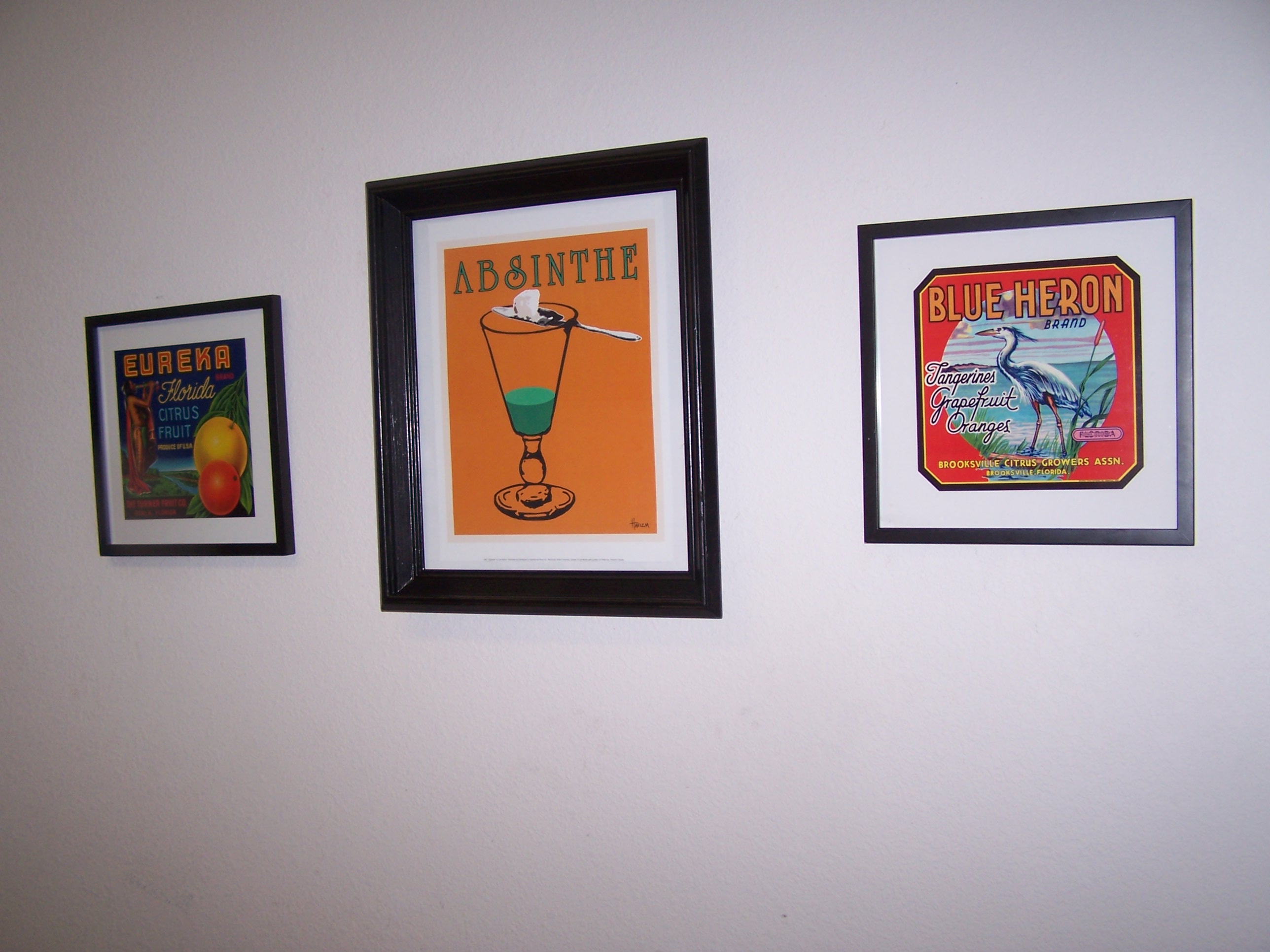 A close up of the framed ads