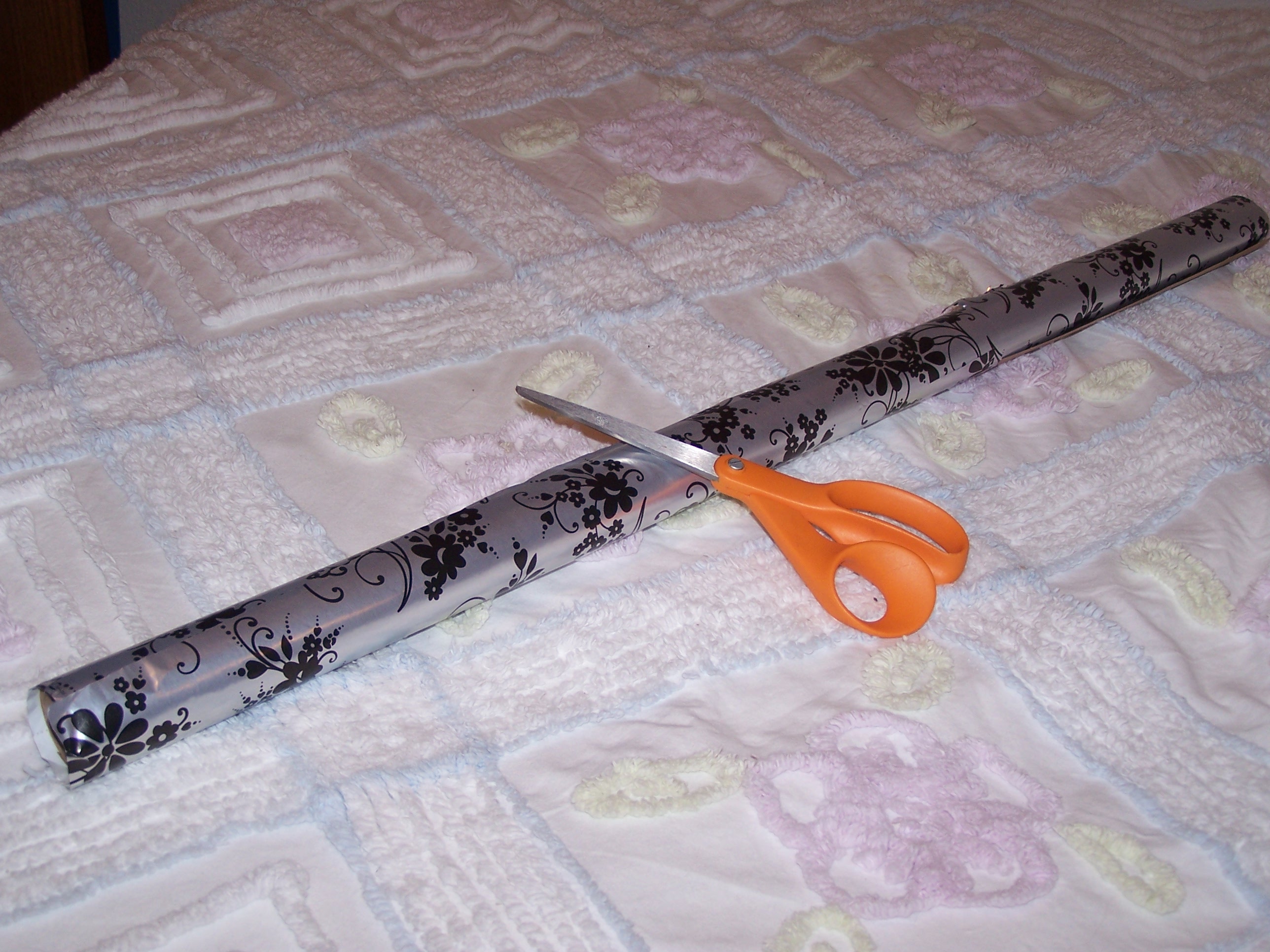 My supplies.  All I used was a scissors and the material (wrapping paper).