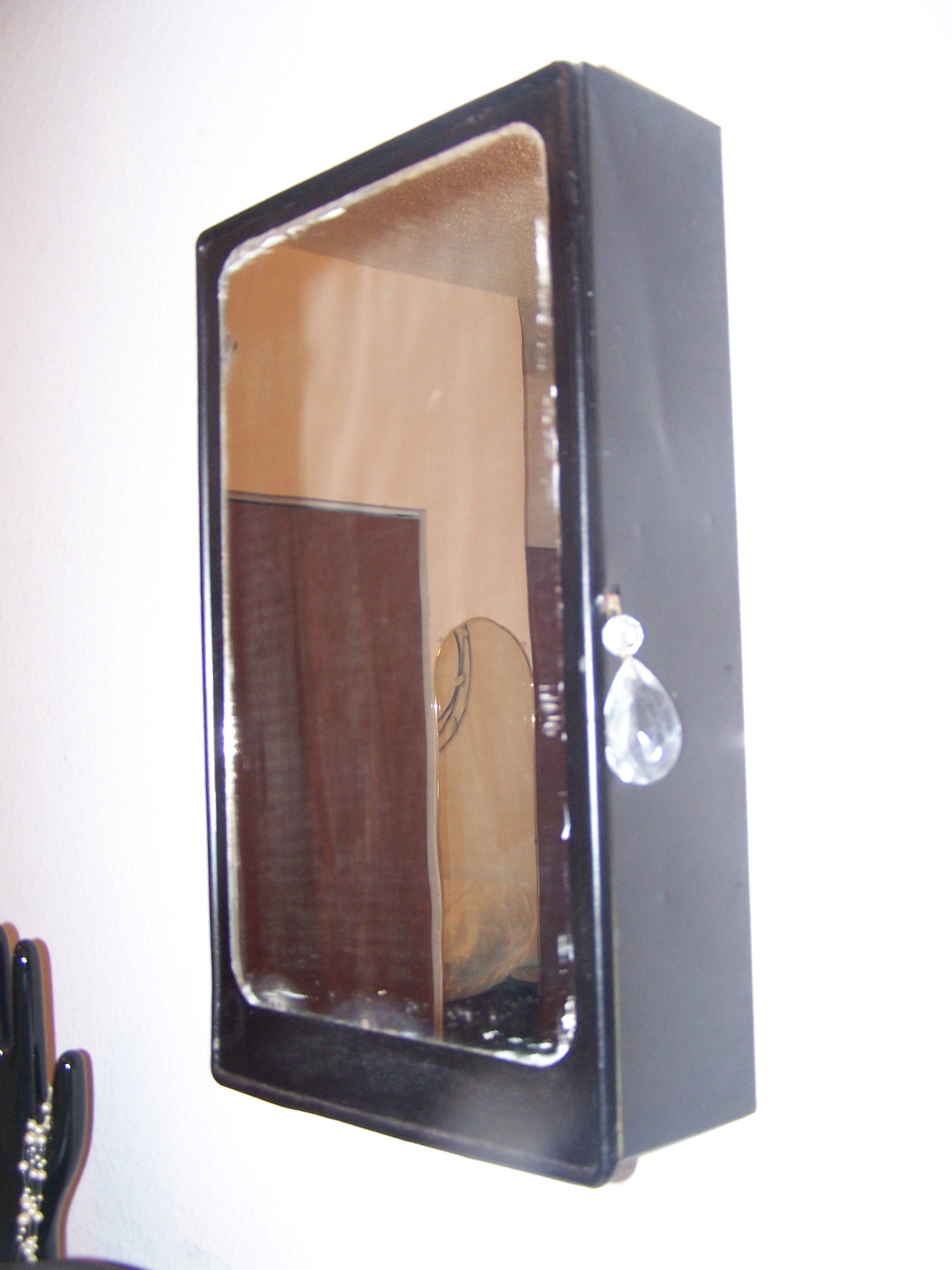 Here is the outside of the medicine cabinet.  I know you have seen this before, but this is a good angle of the chandelier crystal I used as a pull.