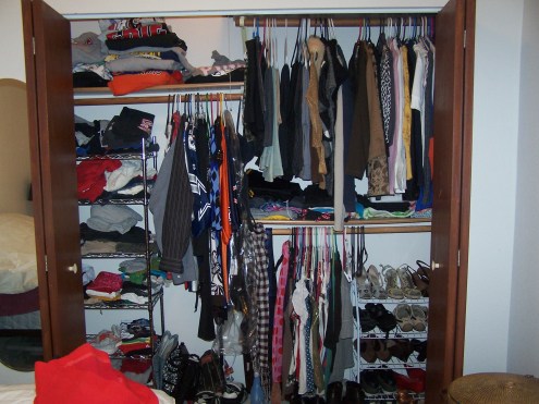 This is a view of the closet as a whole.  The shelving was already installed when we moved in, so we are using it as-is.  It is helpful, but we do not have "sides,"  just "areas."  A little confusing at first, but now it works.