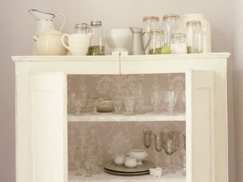 http://www.apartmenttherapy.com/chicago/inspiration/inspiration-lined-cabinets-075583 . Originally from Homes and Gardens.