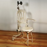 A 1920's-30's doctor's chair.  I know, I love all crazy chairs, but this one would be a real conversation piece!