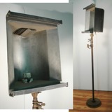 A 1930's- 1940's theater light. This would repurpose as a great lamp.