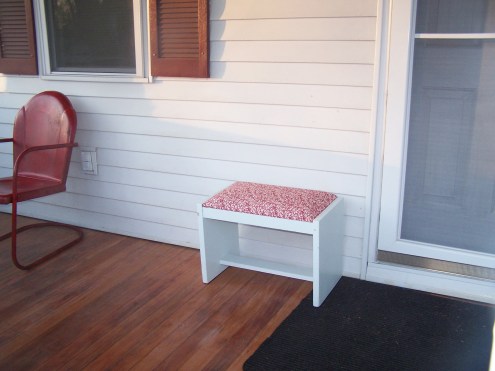 The little bench by the front door and our red vintage lawn chairs! :)