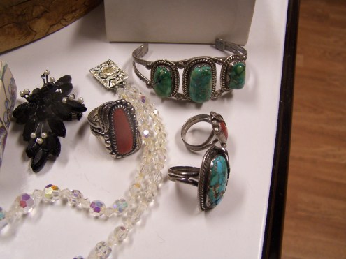 This box was special because my uncle made all of these turqoise and jade rings and pieces.  His sign is a paw print and is engraved on the back of each piece.